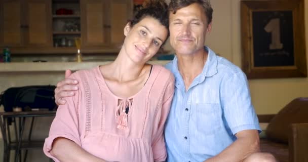 Portrait of a man with his arm around a pregnant woman smiling — Stock Video