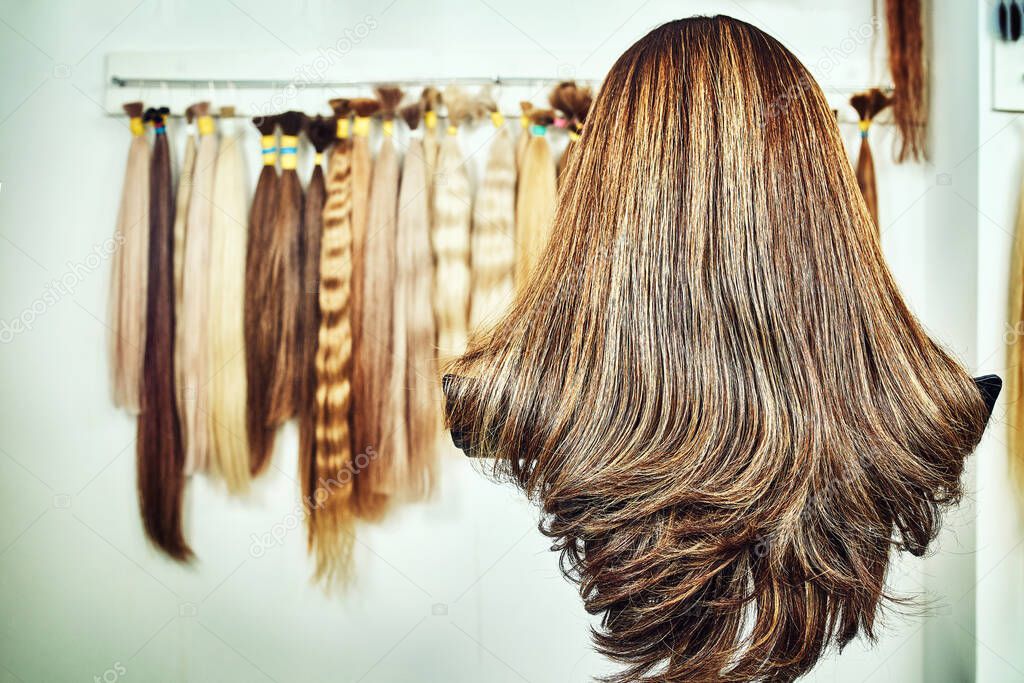 Hair extension equipment of natural hair. hair samples of different colors