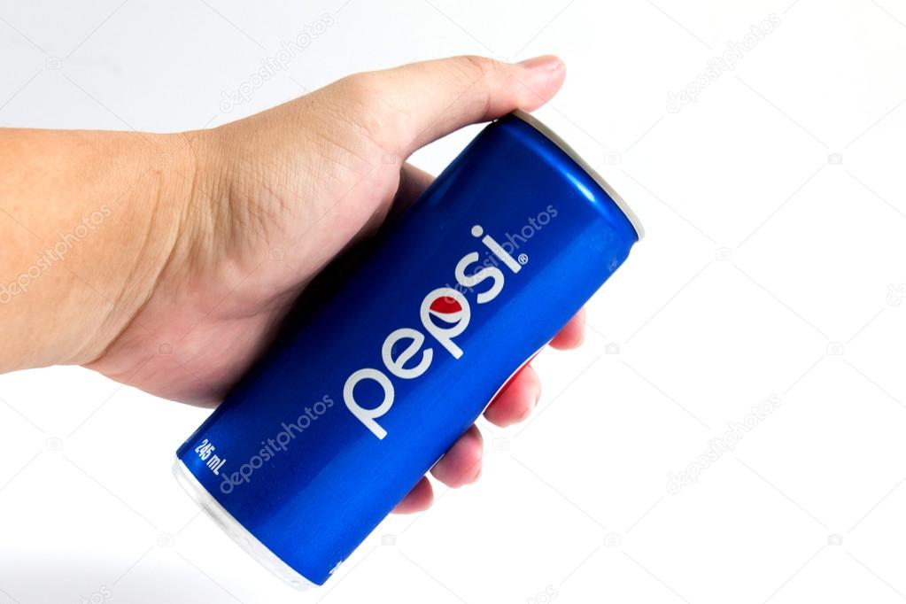 Bangkok, Thailand - October 30, 2016:Pepsi cola hold by male hand on white background. Pepsi is a carbonated soft drink that is produced and manufactured by PepsiCo.