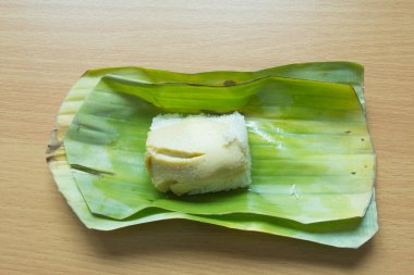 Geleneksel yapışkan pirinç ve Tay muhallebi üzerinde muz yaprak backgrou