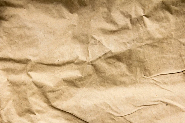 Velho marrom crumpled papel textura fundo — Fotografia de Stock