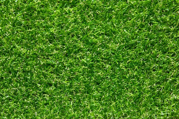 Grama verde artificial textura fundo — Fotografia de Stock