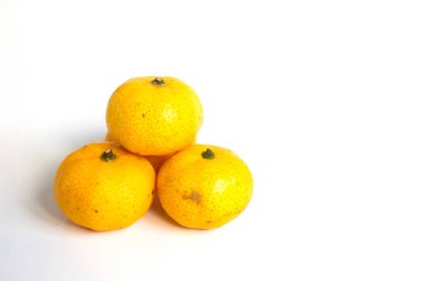 Group of mandarin orange (Citrus reticulata) on white background clipart