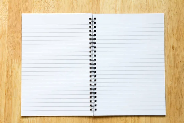 张空白的纸笔记本上木表背景 — 图库照片