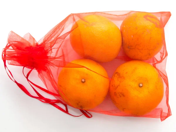 Grupo de laranja em saco vermelho para o ano novo chinês — Fotografia de Stock