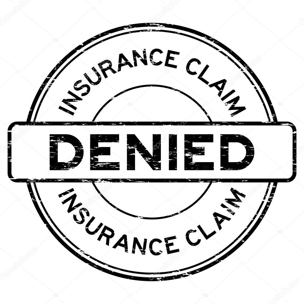Grunge black insurance claim denied round rubber seal stamp