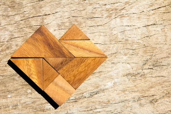 Tangram puzzle szív alakú fa háttér — Stock Fotó