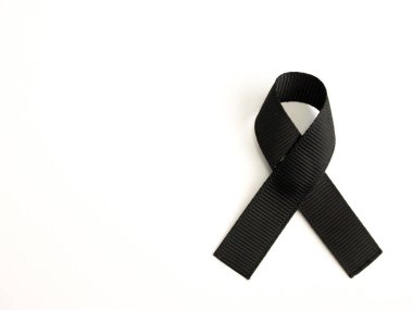 Black ribbon awareness on white background clipart