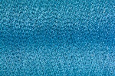 Mavi renk iplik doku arka planını kapandı