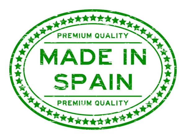 Grunge zelené špičkové kvality vyrobené ve Španělsku s ikonu hvězdičky oválné razítko — Stockový vektor
