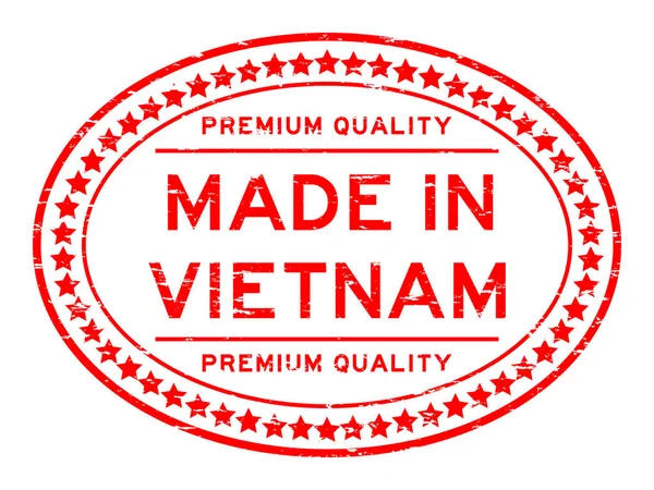 Grunge röd premiumkvalitet tillverkad i Vietnam oval gummi sigill stämpel på vit bakgrund — Stock vektor