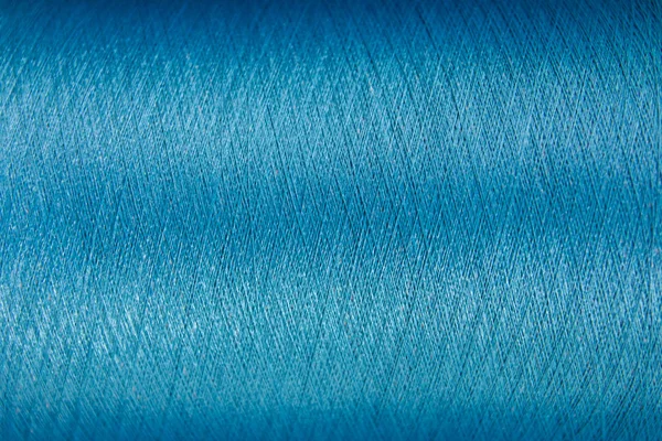 Zamknięte z niebieski kolor wątku tekstura tło — Zdjęcie stockowe