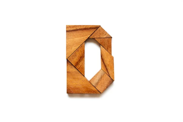 Wooden tangram puzzle as English alphabet letter "B" shape on white background — Stock Photo, Image