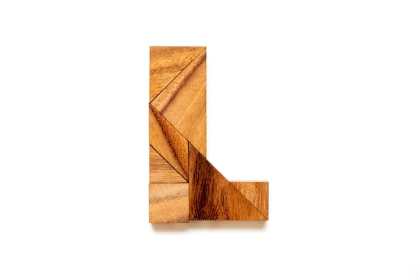 Wooden tangram puzzle as English alphabet letter "L" shape on white background — Stock Photo, Image