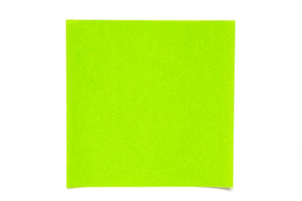 Foglio di carta di colore verde chiaro su sfondo bianco utilizzato per la decorazione o elemento di design — Foto Stock