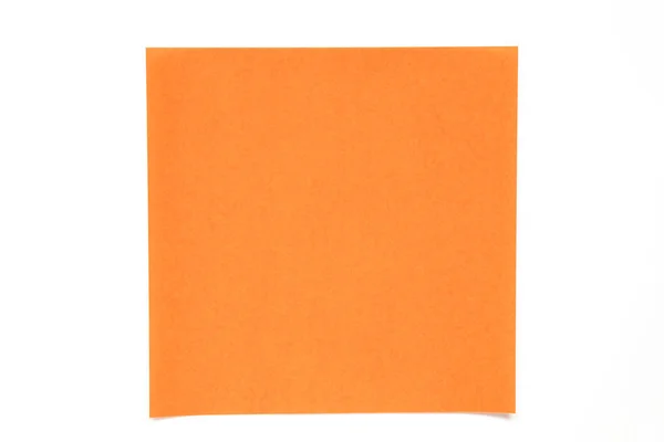 Foglio di carta di colore arancione su sfondo bianco utilizzato per la decorazione o elemento di design — Foto Stock