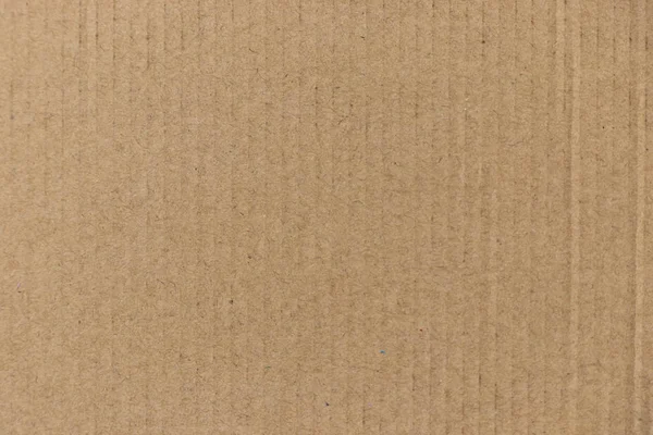 Fechado de cor marrom papelão ondulado fundo usado como papel de parede, decoração, elemento de design — Fotografia de Stock