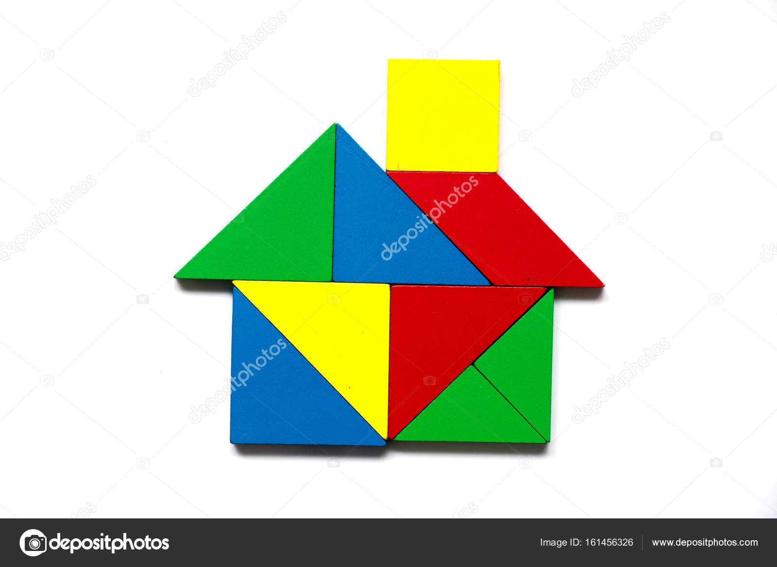 Colorful tangram as home shape on white background (Concept for — Stock Photo © thaneeh.gmail.com #161456326