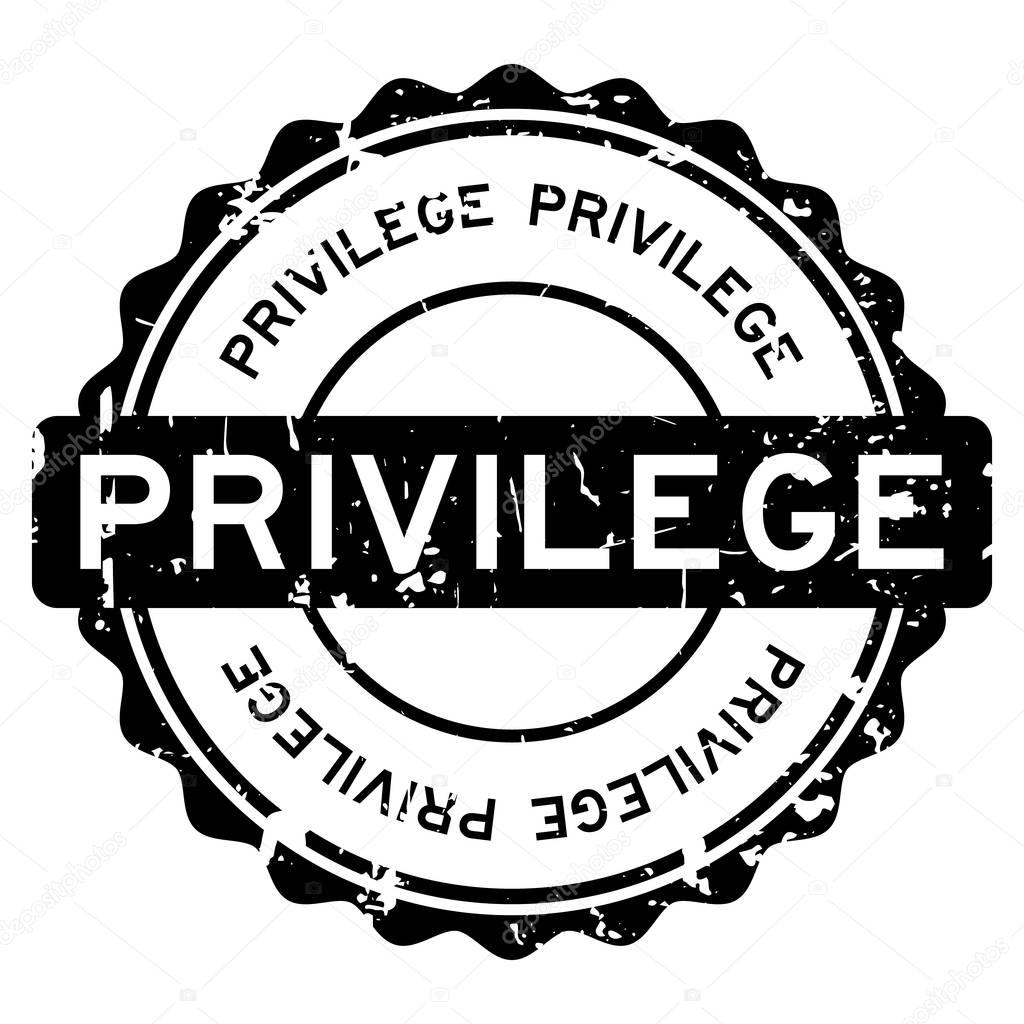Grunge black privilege round rubber seal stamp on white background