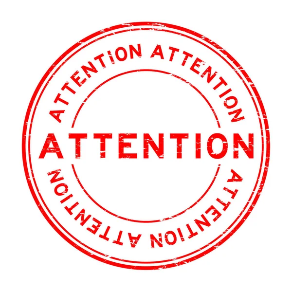 Grunge kırmızı dikkat yuvarlak lastik mühür damgası beyaz arka plan üzerinde
