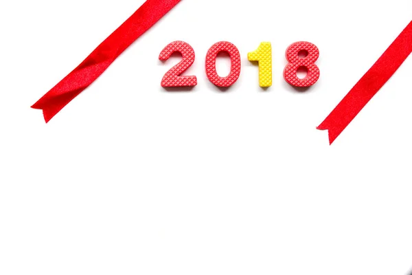 Wording 2018 by toy alphabet with red ribbon on white background — Stock Photo, Image