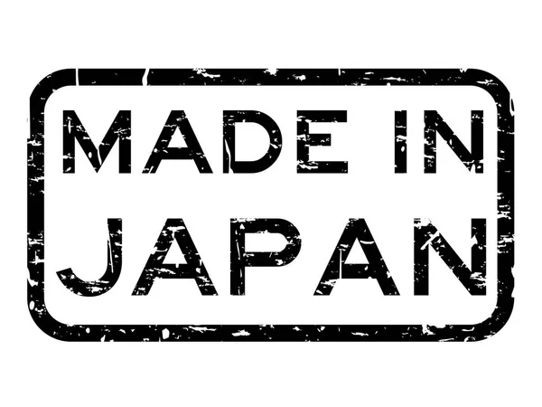 Grunge nero fatto in Giappone sigillo di gomma quadrata timbro su sfondo bianco — Vettoriale Stock