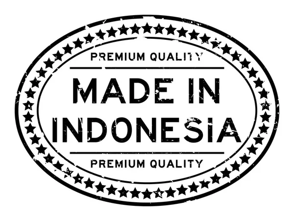 Grunge noir de qualité supérieure fabriqué en Indonésie timbre de joint en caoutchouc ovale sur fond blanc — Image vectorielle