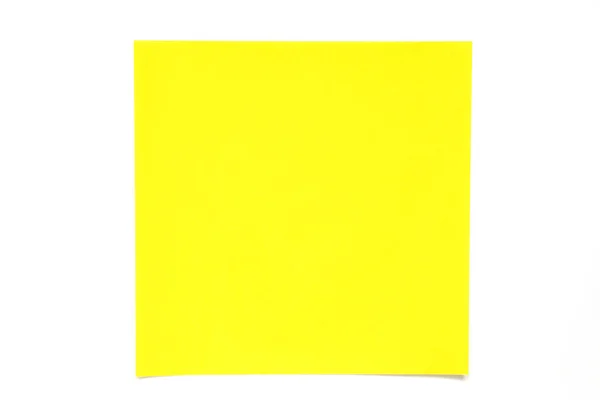 Foglio di carta di colore giallo su sfondo bianco utilizzato per la decorazione o elemento di design — Foto Stock
