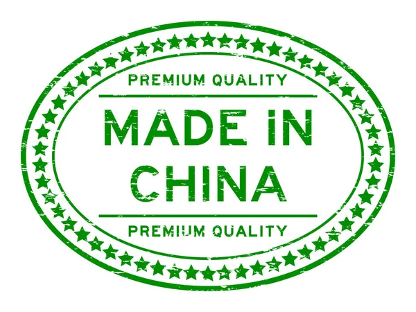Grunge vert qualité premium fabriqué en Chine timbre de joint en caoutchouc ovale sur fond blanc — Image vectorielle