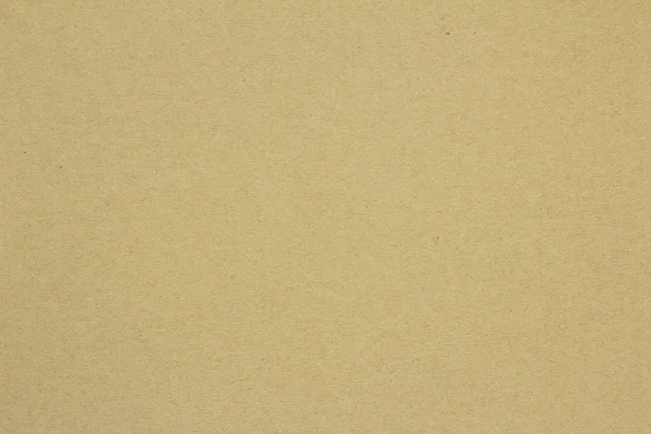 Gelbe Farbe des Kraftpapiers strukturierten Hintergrund — Stockfoto