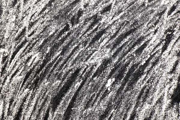 Textura de pintura de tiza blanca sobre fondo de pizarra negra para decoración o capa grunge —  Fotos de Stock