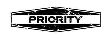 Grunge siyah öncelikli ifadeler altıgen lastik mühür damgası beyaz arka plan üzerinde