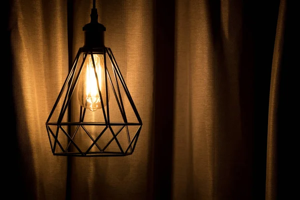 Yellow lamp hanging with curtain background — Stock Photo, Image