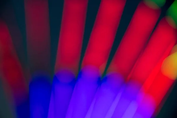 Abstrato multi cor de fluorescente sobre fundo preto — Fotografia de Stock