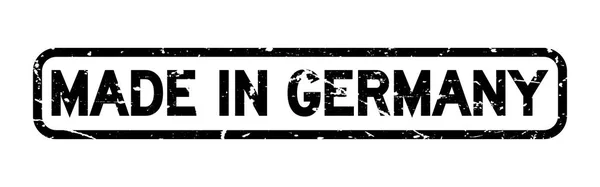 Grunge nero fatto in Germania parola sigillo di gomma quadrata timbro su sfondo bianco — Vettoriale Stock