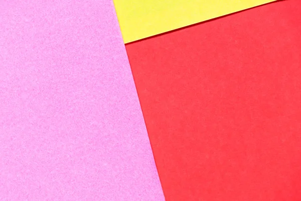 ピンク、赤と黄色のカラー ペーパー表示空白の抽象的な背景として — ストック写真