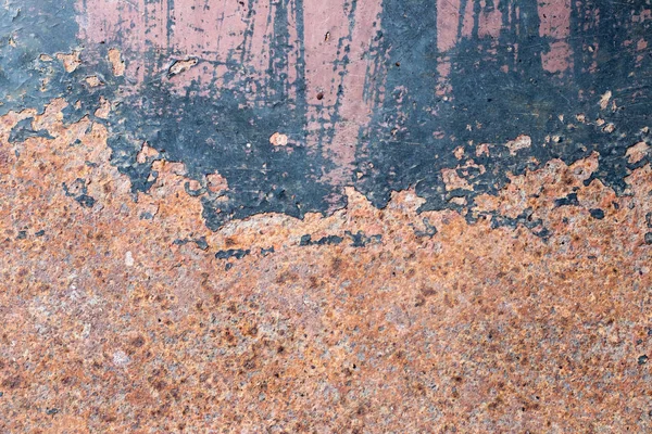 Grunge red brown rust on black metallic sheet textured background