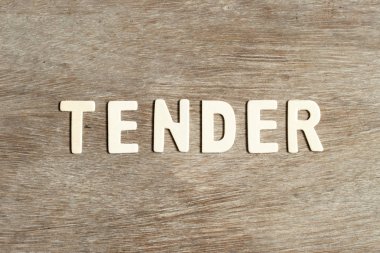 Tahta zemin üzerinde kelime ihalesi ile alfabe harfi