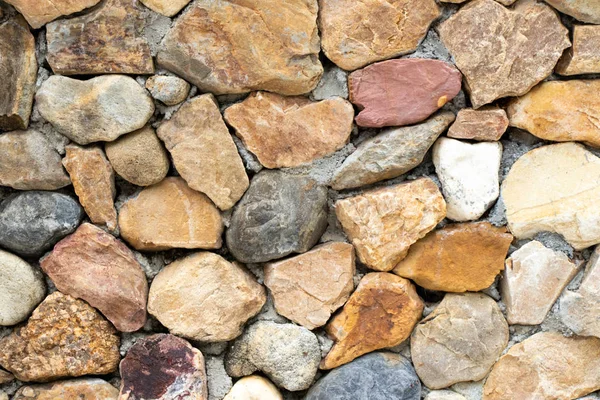Taş duvar arkaplanına çok sayıda kaya bileşimi — Stok fotoğraf