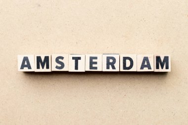 Letter block in word Amsterdam on wood background