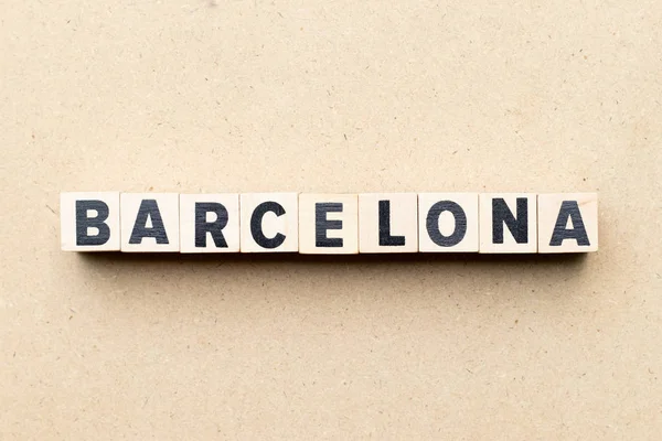 Alphabet letter block in word barcelona on wood background — 스톡 사진