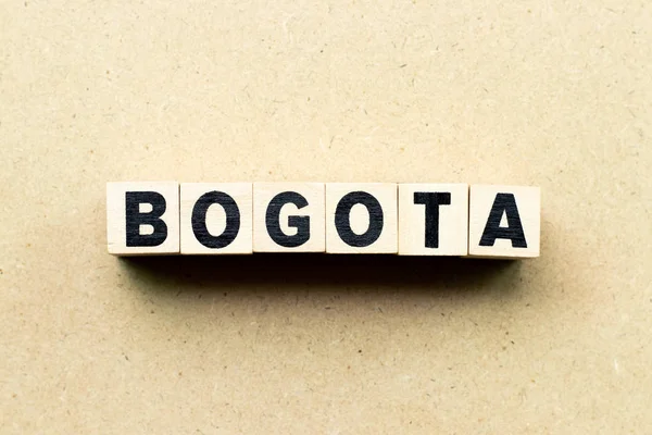Písmeno blok ve slově Bogota na pozadí dřeva — Stock fotografie