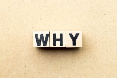 Letter block in word why on wood background