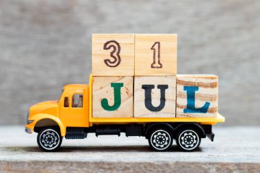 Müdahale aracı tahta zemin üzerinde kelime 31 Haziran engelleme (31 Temmuz için kavram)