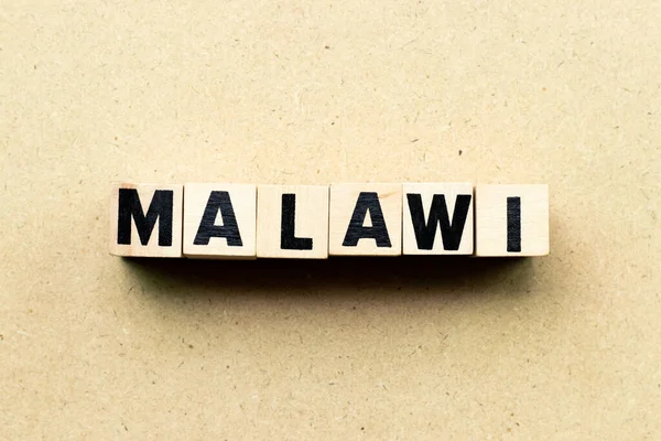 Alfabeto Letra Bloco Palavra Malawi Fundo Madeira — Fotografia de Stock