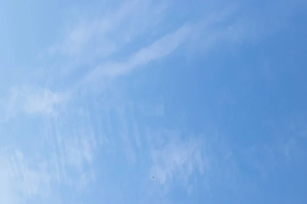 Clear blue color sky with white cloud background