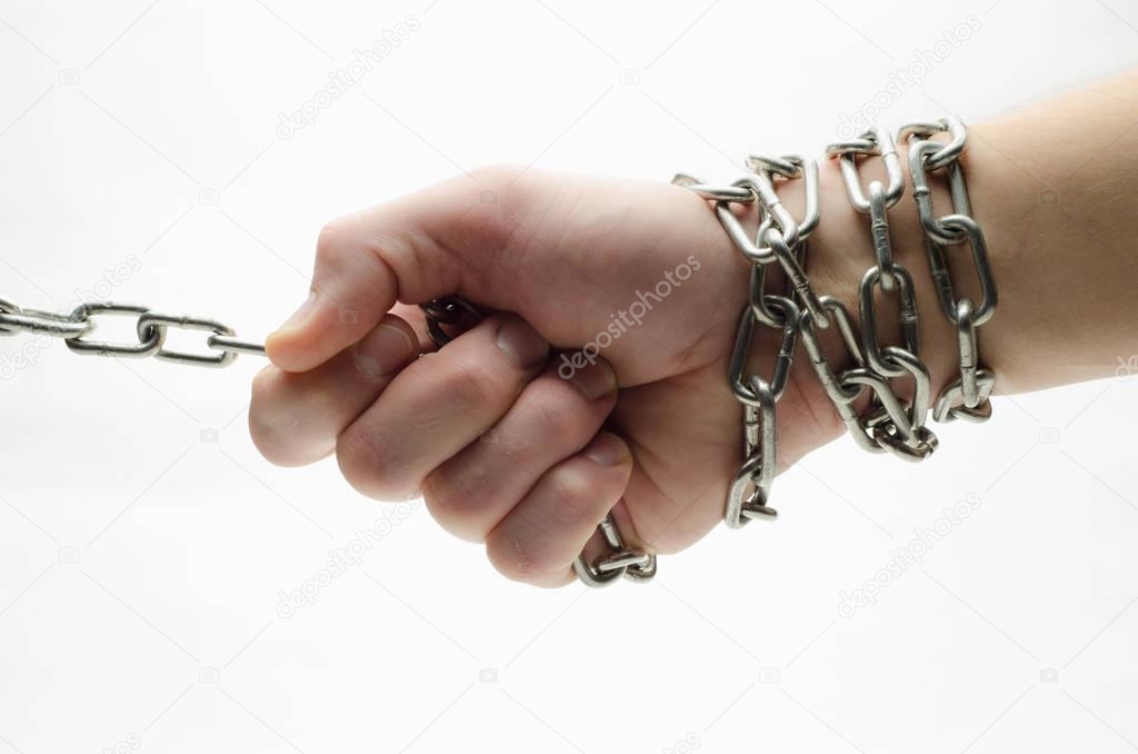 Hands are chained in chains isolated on white background