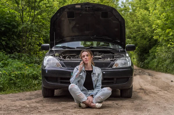 Young Girl Sits Broken Car Road Open Hood Calls Rescue Royalty Free Stock Photos