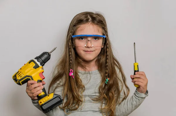 Little Charming Girl Child Safety Glasses Electric Screwdriver Screwdriver Light — Stock Photo, Image