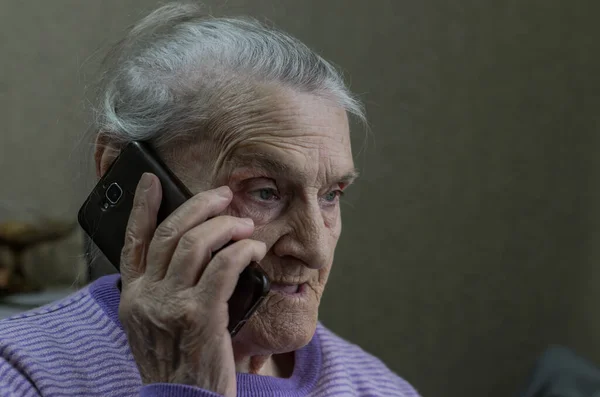 Elderly Woman Talking Video Calling Smartphone Her Young Daughter Lockdownart Royalty Free Stock Images